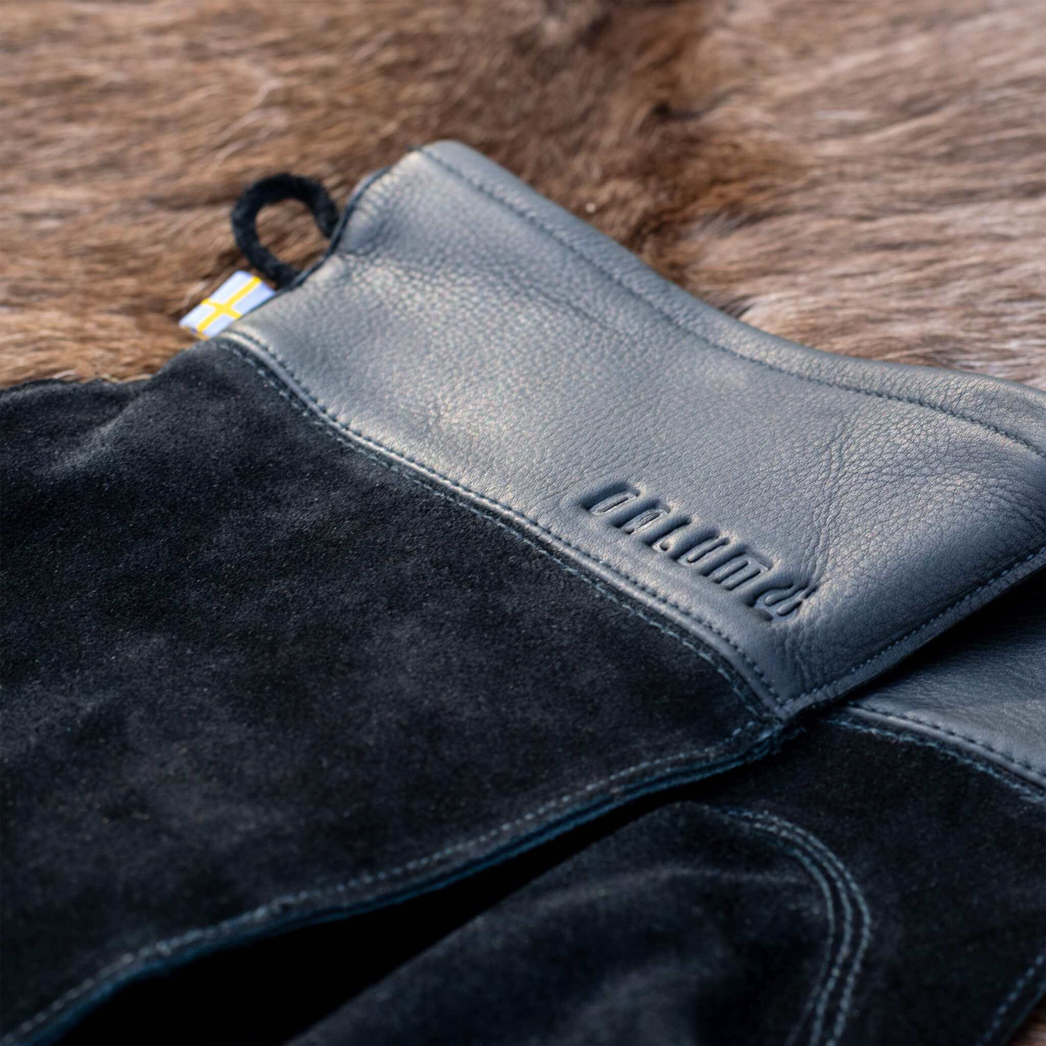 Stekhällshandske med förvaringspåse